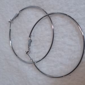 Large silver toned hoop earrings, post